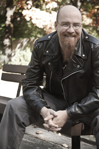 Von Allan, graphic novelist and comic book writer, sitting outside