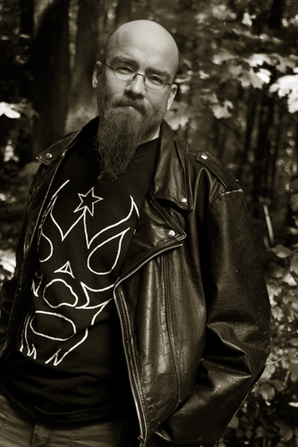 Close-up on Von Allan, graphic novelist and comic book writer, in his studio